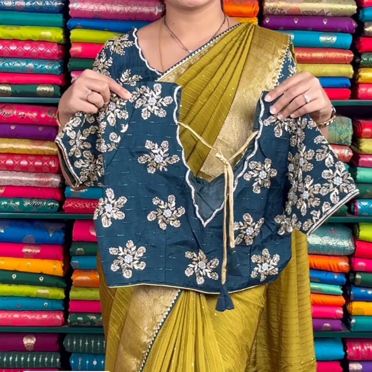 Mustard Yellow Crinkle-Textured Saree with Ornate Gold Zari Border and Embroidered Teal Blouse thumbnail 2