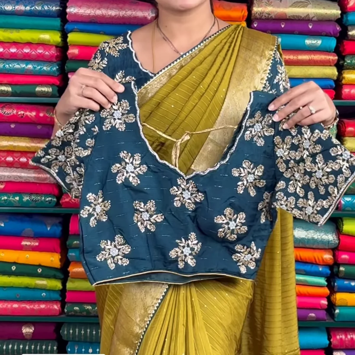 Mustard Yellow Crinkle-Textured Saree with Ornate Gold Zari Border and Embroidered Teal Blouse thumbnail 3