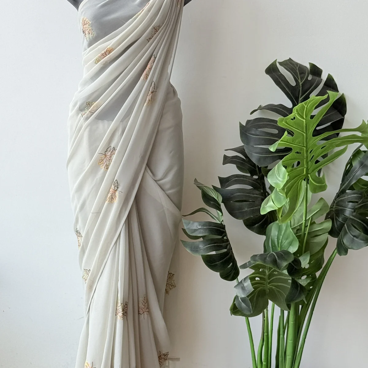 Pastel green maple leaf emb georgette saree thumbnail 2